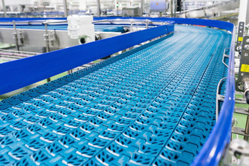Naklejka premium Empty conveyor belt of production line, part of industrial equipment