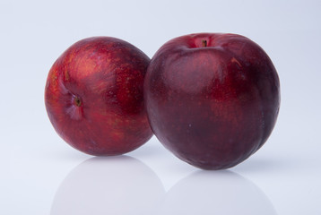 Plum. Ripe plum fruit on background