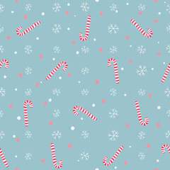 Christmas seamless pattern with striped lollypops, stars and snowflakes