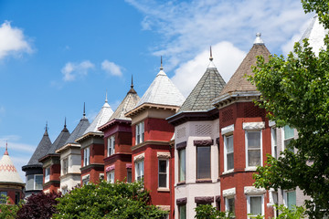Row houses in the Washington DC neighborhood of Bloomingdale on a summer day.