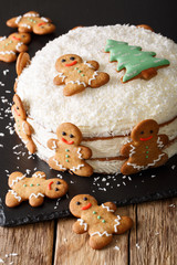 Delicious and beautiful Christmas ginger cake with cheese cream close-up. vertical