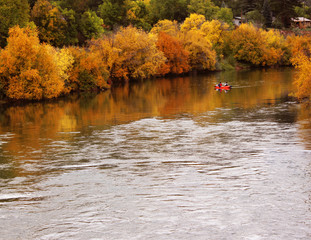 River with Autumn Reflections and Kayaker