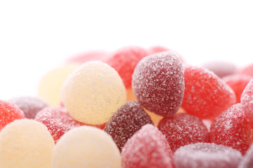 Colorful jelly sugar candies close up isolated in white background