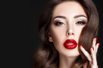 Fashion woman portrait on black background with red shiny lips and red nails. - 180816760