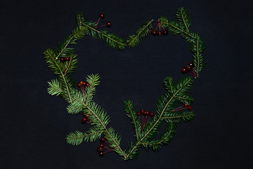 Christmas tree heart on a dark background