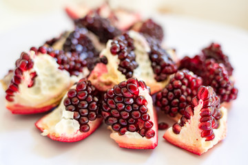 Pomegranate with red seeds visible