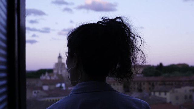 Woman overlooks Tarazona cityscape