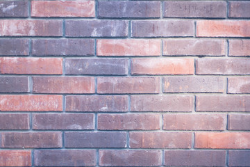 Brick wall background. Background from bricks of different shades.