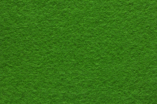 Green felt texture . Close up