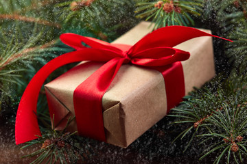 Christmas background with xmas tree and sparkle bokeh lights on wooden canvas background. Merry christmas card. Winter holiday theme. Happy New Year. Space for text. Happy Holidays