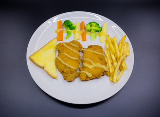 Fried fish steak in plate