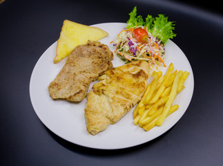 Ham steak on a plate