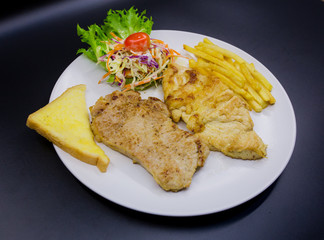 Ham steak on a plate