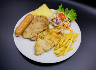 Ham steak on a plate