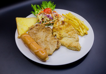 Ham steak on a plate