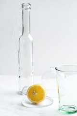 Glassware and half a lemon. Conceptual food photo..
