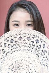 Closeup of a cute asian girl with hat