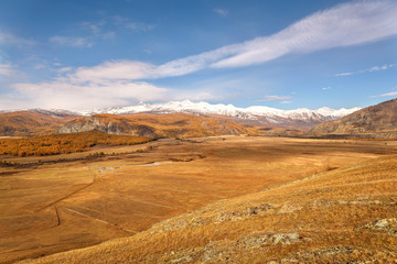 mountains steppe aerial view autumn snow clouds