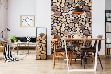 Rustic apartment with table and sofa