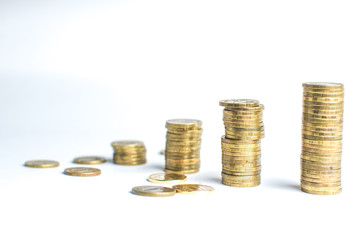 Coin stacks on white background different heights