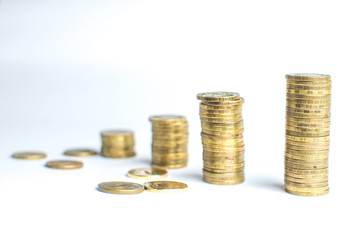 Coin stacks on white background different heights