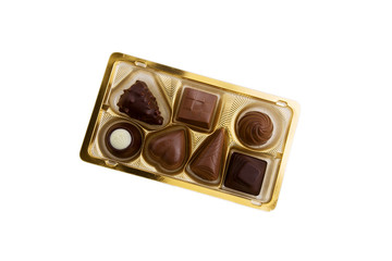 A collection of mixed chocolates against a white background
