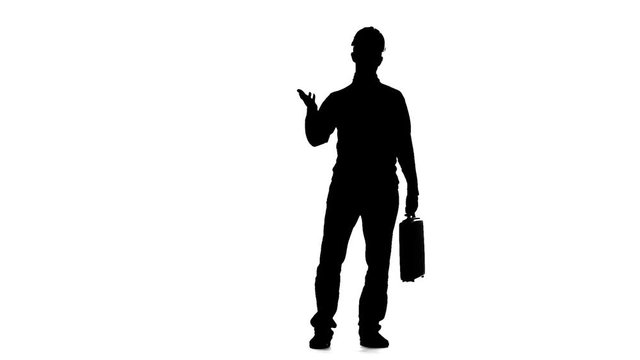 Engineer with a diplomat in his hands . Silhouette. White background. Slow motion