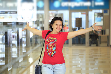 Petersburg, Russia - June 29, 2017: the joyful girl leaves the bank.