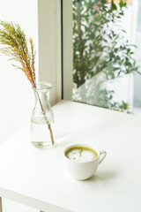 hot green tea latte cup
