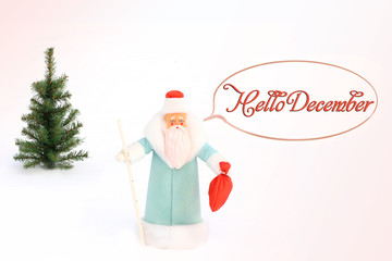 Santa Claus (Father Frost) and Christmas tree in the snow