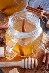 Honey with cinnamon sbiten, selective focus