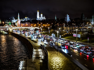 Naklejka premium night time city moscow kremlin traffic river