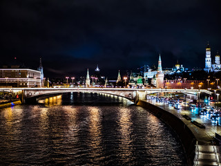 Fototapeta na wymiar night time city moscow kremlin traffic bridge over the river
