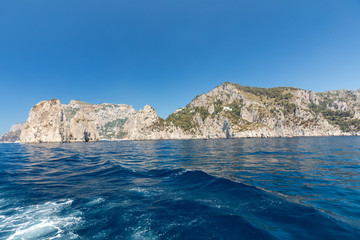 View from the boat on the cliff coast of Capri Island, Italy