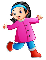Cute cartoon girl in winter clothes waving