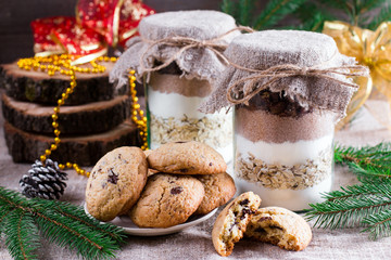 Chocolate chips cookies ingredients in a glass jar