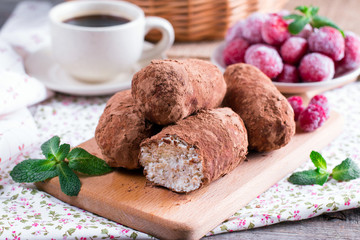 Chocolate rum balls cakes decorated with cocoa