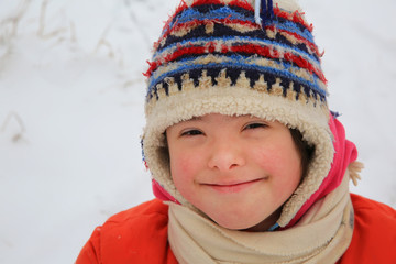 Portrait of beautiful little girl in the winter