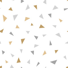 Simple geometric seamless pattern with small golden and silver triangle forms. Repeat small gold color glitter figures. Vector holiday decor background.