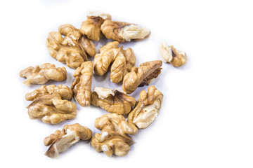 Fresh cleaned walnuts kernels on the white background
