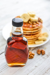 Maple syrup in glass bottle