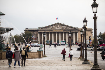 Paris, France - November, 2017. Streets of Paris, France. Blue sky, buildings and traffic.