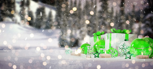 Green and white christmas gifts and baubles on snow 3D rendering