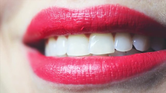Perfect natural red lip makeup. Beautiful female mouth. Plump full lips. Closep