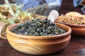 herbal tea in bulk in wooden bowls on the table