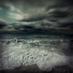 Obraz premium View of great storm on the sea. Strong wind and big waves with s