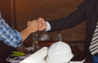 Business Partners Trust in Team Giving Fist Bump to Greeting work Contractor.Businessman Teamwork are Partnership in Office Team Meeting together. Industry Business Work Concept