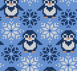 Penguin jacquard knitted seamless pattern. Winter blue background with cute animals. Northern style. Vector illustration.