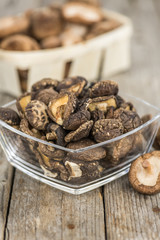 Dried Shiitake mushrooms close-up shot, selective focus