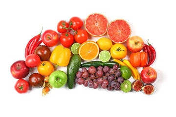 Many different fruits and vegetables on white background
